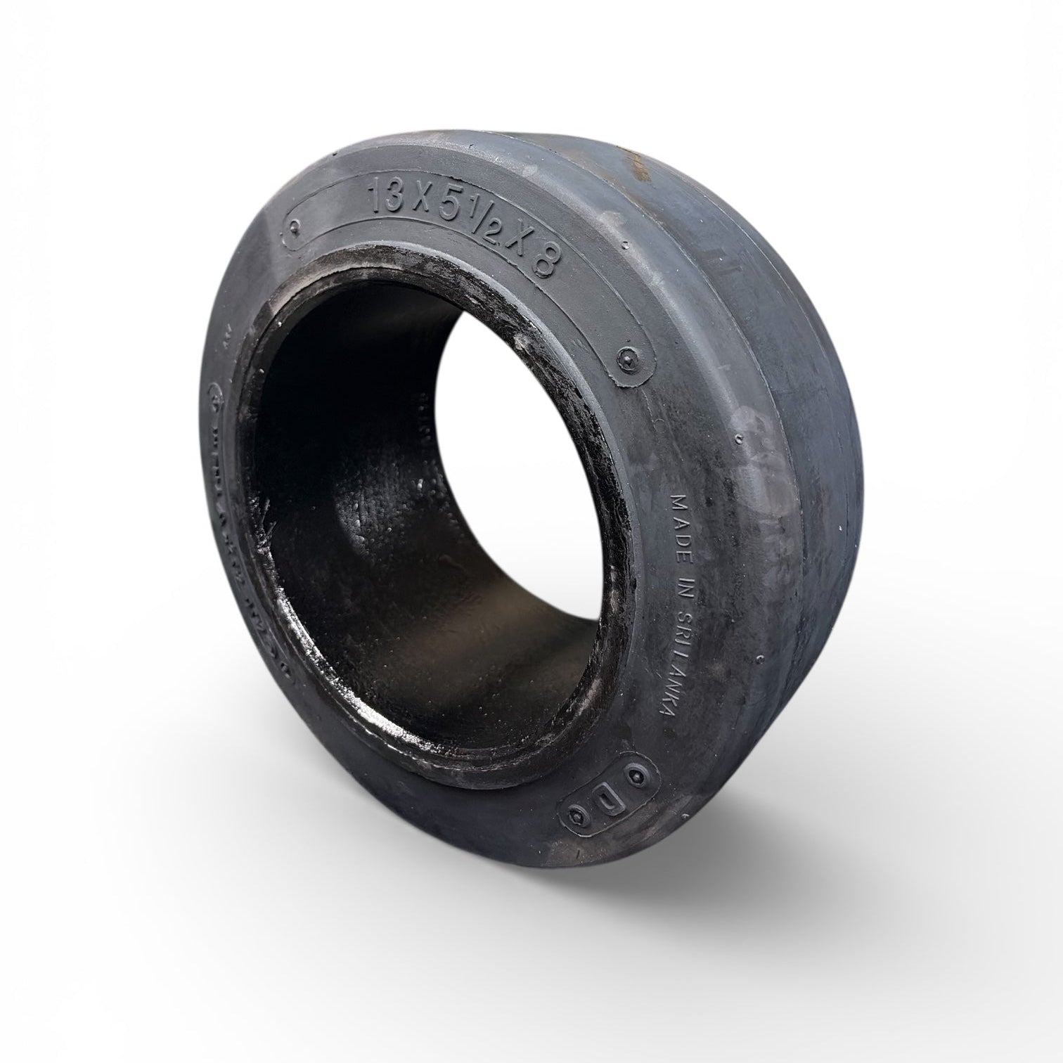 Black rubber forklift tire on a white background
