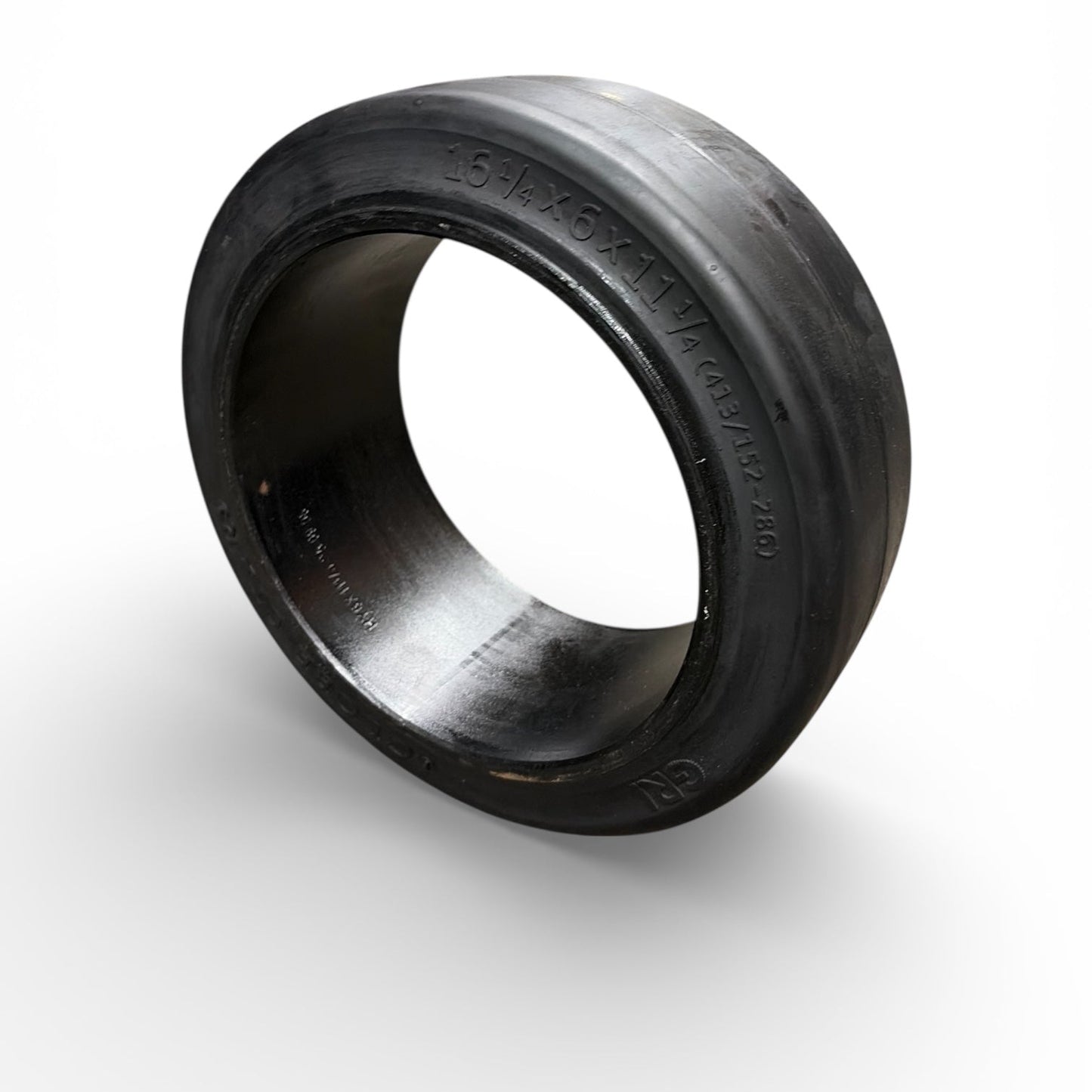 Black rubber tire inner liner on a white background