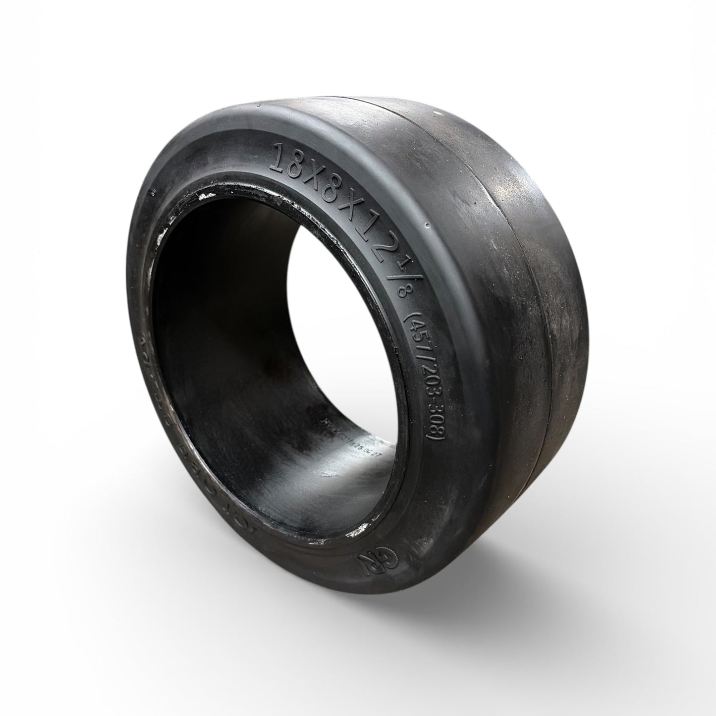 Black rubber tire rim on a white background