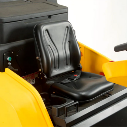 Black seat of a yellow piece of machinery on a white background cat c70r