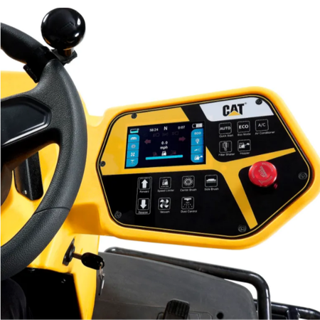 Control panel of a yellow machine with a steering wheel, featuring the Caterpillar logo on c70r
